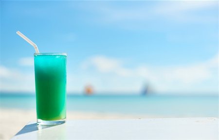 Cocktail at the beach,  shallow depth of field Stock Photo - Budget Royalty-Free & Subscription, Code: 400-05897566