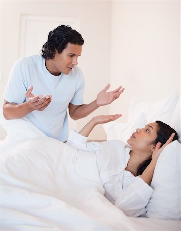 snoring couple - Young couple fighting in the bedroom Photographie de stock - Aubaine LD & Abonnement, Code: 400-05897670