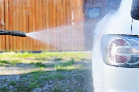 spraying water hose - Car washing on open air Stock Photo - Budget Royalty-Free & Subscription, Code: 400-05897796
