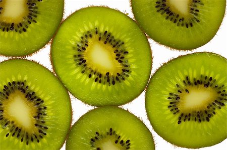 simsearch:400-04553701,k - Close-up view of kiwi slices over white background Stock Photo - Budget Royalty-Free & Subscription, Code: 400-05898078