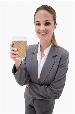 simsearch:400-04188263,k - Portrait of a businesswoman holding a takeaway coffee against a white background Foto de stock - Super Valor sin royalties y Suscripción, Código: 400-05898178