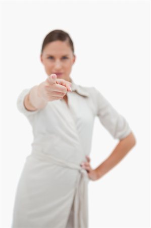simsearch:400-05895521,k - Portrait of a businesswoman pointing at the viewer against a white background Stock Photo - Budget Royalty-Free & Subscription, Code: 400-05898228