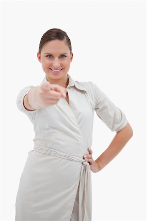 simsearch:400-05895521,k - Portrait of a smiling businesswoman pointing at the viewer against a white background Stock Photo - Budget Royalty-Free & Subscription, Code: 400-05898229
