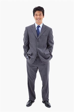 simsearch:400-04963726,k - Portrait of a businessman standing up against a white background Stock Photo - Budget Royalty-Free & Subscription, Code: 400-05898278