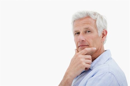 single man in arm of nature - Mature man thinking against a white background Stock Photo - Budget Royalty-Free & Subscription, Code: 400-05898519