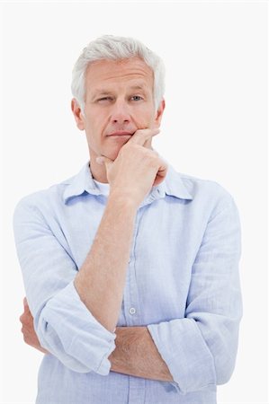 single man in arm of nature - Portrait of a thoughtful mature man against a white background Stock Photo - Budget Royalty-Free & Subscription, Code: 400-05898512