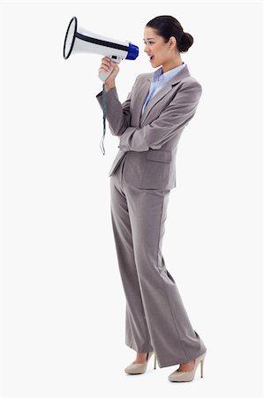 simsearch:400-06763387,k - Portrait of a businesswoman shouting through a megaphone against a white background Stock Photo - Budget Royalty-Free & Subscription, Code: 400-05898599