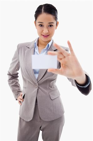 simsearch:400-04648812,k - Portrait of a gorgeous businesswoman showing a blank business card against a white background Stock Photo - Budget Royalty-Free & Subscription, Code: 400-05898618