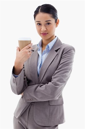 simsearch:400-04188263,k - Portrait of a businesswoman holding a takeaway tea against a white background Foto de stock - Super Valor sin royalties y Suscripción, Código: 400-05898611