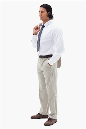 simsearch:6116-08915424,k - Portrait of a serious office worker holding his jacket over his shoulder against a white background Foto de stock - Super Valor sin royalties y Suscripción, Código: 400-05898675