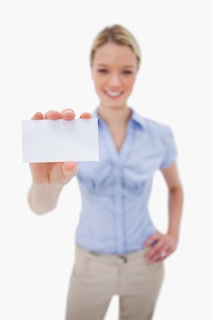 simsearch:400-05368656,k - Blank business card being held by woman against a white background Stockbilder - Microstock & Abonnement, Bildnummer: 400-05898814