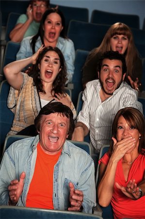 Aghast audience of 7 men and women scream Stock Photo - Budget Royalty-Free & Subscription, Code: 400-05898850