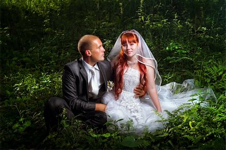 dress woman walk forest - Wedding couple sitting on grass in forest Stock Photo - Budget Royalty-Free & Subscription, Code: 400-05898853