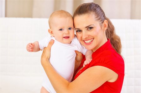 simsearch:400-06067090,k - Portrait of adorable baby and young mother Stockbilder - Microstock & Abonnement, Bildnummer: 400-05899087