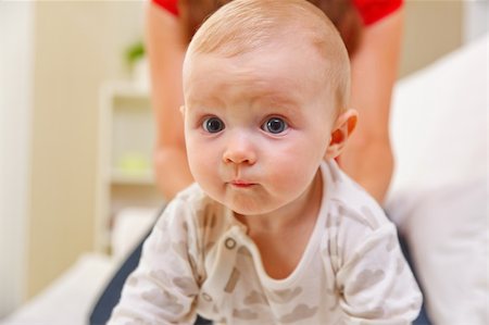 simsearch:400-06067090,k - Portrait of interested baby playing with mother Stockbilder - Microstock & Abonnement, Bildnummer: 400-05899080