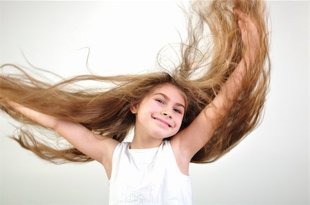 beautiful happy smiling girl with long hair Photographie de stock - Aubaine LD & Abonnement, Code: 400-05899299