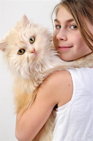 simsearch:400-06565435,k - close-up portrait of a little girl with a Persian breed cat Stockbilder - Microstock & Abonnement, Bildnummer: 400-05899301