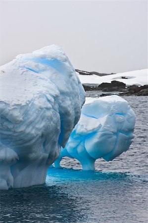 simsearch:400-04299207,k - Huge iceberg in Antarctica, clear sky, azure water, sunny day Stock Photo - Budget Royalty-Free & Subscription, Code: 400-05899535