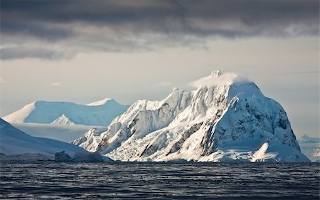 Beautiful snow-capped mountains against the sky Stock Photo - Budget Royalty-Free & Subscription, Code: 400-05899536