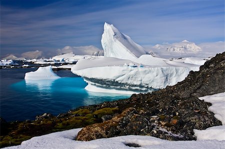 simsearch:400-04299207,k - Huge iceberg in Antarctica, blue sky, azure water, sunny day Stock Photo - Budget Royalty-Free & Subscription, Code: 400-05899531