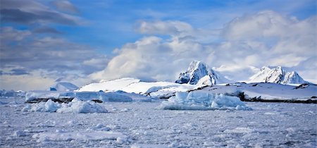 Beautiful snow-capped mountains against the blue sky in Antarctica Stock Photo - Budget Royalty-Free & Subscription, Code: 400-05899588