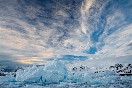 Beautiful snow-capped mountains against the blue sky Stock Photo - Budget Royalty-Free & Subscription, Code: 400-05899641