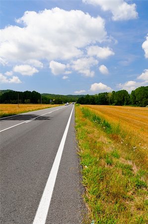 empty country road at summer in Tossa del Mar, Spain Foto de stock - Super Valor sin royalties y Suscripción, Código: 400-05890274