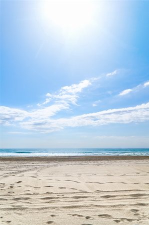 simsearch:400-05891391,k - empty beach at sunny day with footprints, Spain Photographie de stock - Aubaine LD & Abonnement, Code: 400-05890325