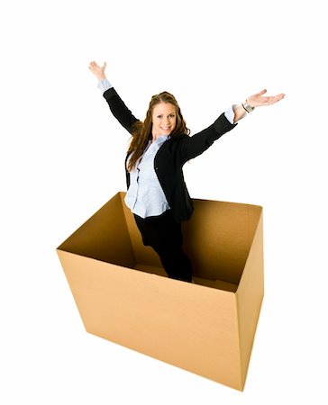 Happy Woman in a cardboard box isolated on white background Stock Photo - Budget Royalty-Free & Subscription, Code: 400-05890509