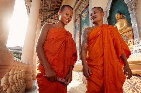 simsearch:400-05706113,k - Two buddhist monks meeting and saluting in a temple, Phnom, Penh, Cambodia, Asia. Dolly shot Stock Photo - Budget Royalty-Free & Subscription, Code: 400-05890791