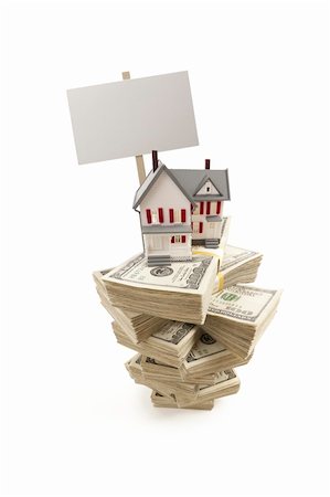 simsearch:400-06770104,k - Small House on Stacks of Hundred Dollar Bills and Blank Sign Isolated on a White Background. Foto de stock - Super Valor sin royalties y Suscripción, Código: 400-05891715