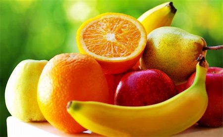 simsearch:400-05115029,k - Colored fruits on table. Stockbilder - Microstock & Abonnement, Bildnummer: 400-05891713