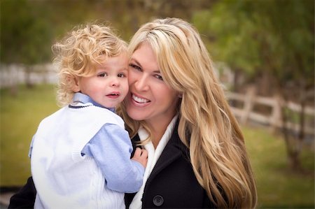 small babies in park - Attractive Mother and Cute Son Portrait Outside at the Park. Photographie de stock - Aubaine LD & Abonnement, Code: 400-05891729