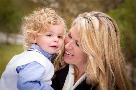 small babies in park - Attractive Mother and Cute Son Portrait Outside at the Park. Stock Photo - Budget Royalty-Free & Subscription, Code: 400-05891730