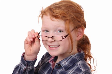 simsearch:400-05712134,k - Portrait of a young girl wearing glasses on white background Foto de stock - Super Valor sin royalties y Suscripción, Código: 400-05891805