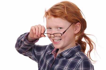 simsearch:400-05712134,k - Portrait of a young girl wearing glasses on white background Photographie de stock - Aubaine LD & Abonnement, Code: 400-05891808