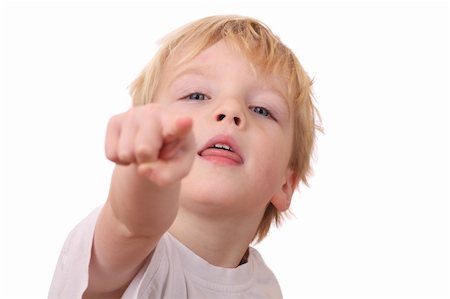 preteen beautiful face - Portrait of a young boy pointing with his finger Stock Photo - Budget Royalty-Free & Subscription, Code: 400-05891815