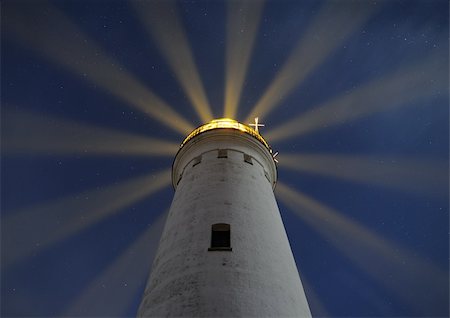 Lighthouse with light beams Stock Photo - Budget Royalty-Free & Subscription, Code: 400-05892155