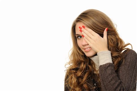 Young female is gazing through her fingers Stock Photo - Budget Royalty-Free & Subscription, Code: 400-05892160