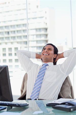 simsearch:400-05900688,k - Portrait of a delighted businessman relaxing in his office Foto de stock - Super Valor sin royalties y Suscripción, Código: 400-05892346