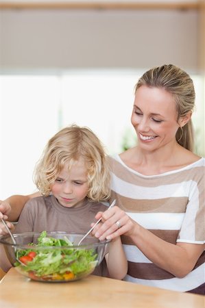 simsearch:400-04792006,k - Mother and son stirring salad together Stock Photo - Budget Royalty-Free & Subscription, Code: 400-05893041