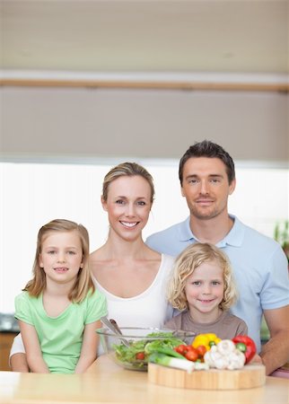 simsearch:400-04792006,k - Family standing together behind kitchen counter Stock Photo - Budget Royalty-Free & Subscription, Code: 400-05893057