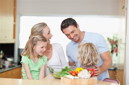 simsearch:400-04792006,k - Happy family together in the kitchen Stock Photo - Budget Royalty-Free & Subscription, Code: 400-05893059