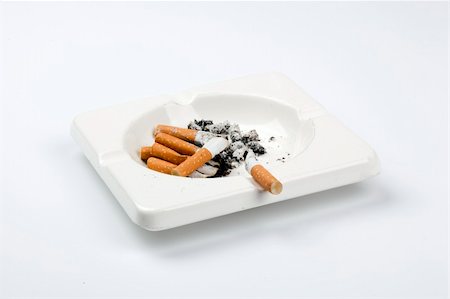 ashtray full of cigarettes on white Stock Photo - Budget Royalty-Free & Subscription, Code: 400-05893824