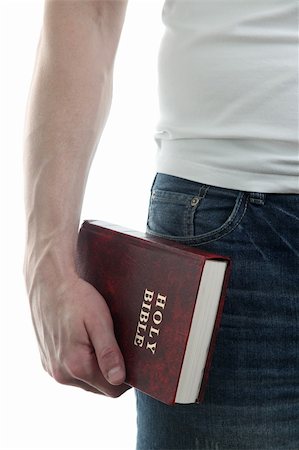 Man holding the Holy Bible, isolated on white background Stock Photo - Budget Royalty-Free & Subscription, Code: 400-05904206