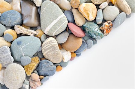 a pile of pebbles isolated Stockbilder - Microstock & Abonnement, Bildnummer: 400-05904239