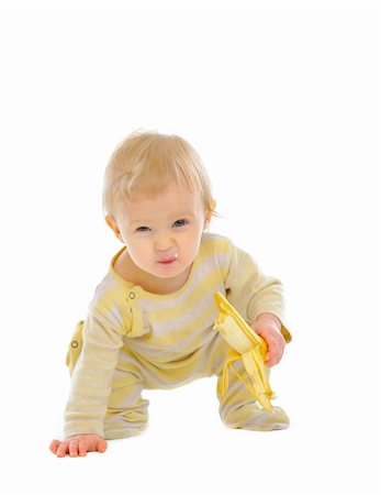 Cheerful baby eating banana isolated on white Stock Photo - Budget Royalty-Free & Subscription, Code: 400-05904282