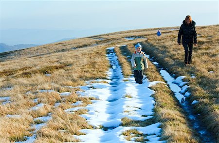 Family (mother with children) walk on autumn  mountain plateau with first winter snow Stock Photo - Budget Royalty-Free & Subscription, Code: 400-05904354
