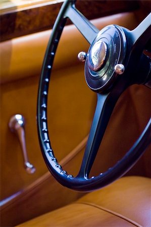 restoring cars - Closeup on vintage car steering wheel, interior retro oldtimer Stock Photo - Budget Royalty-Free & Subscription, Code: 400-05904401