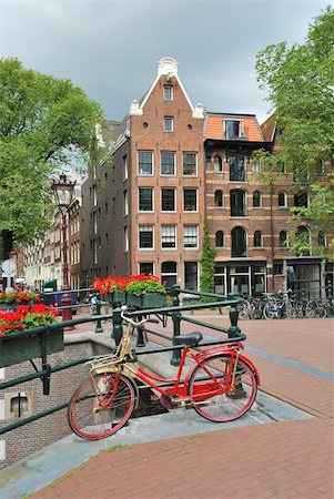 Amsterdam. Beautiful  bridge decorated with flowers over  the canal Brouwersgracht Stock Photo - Budget Royalty-Free & Subscription, Code: 400-05904436